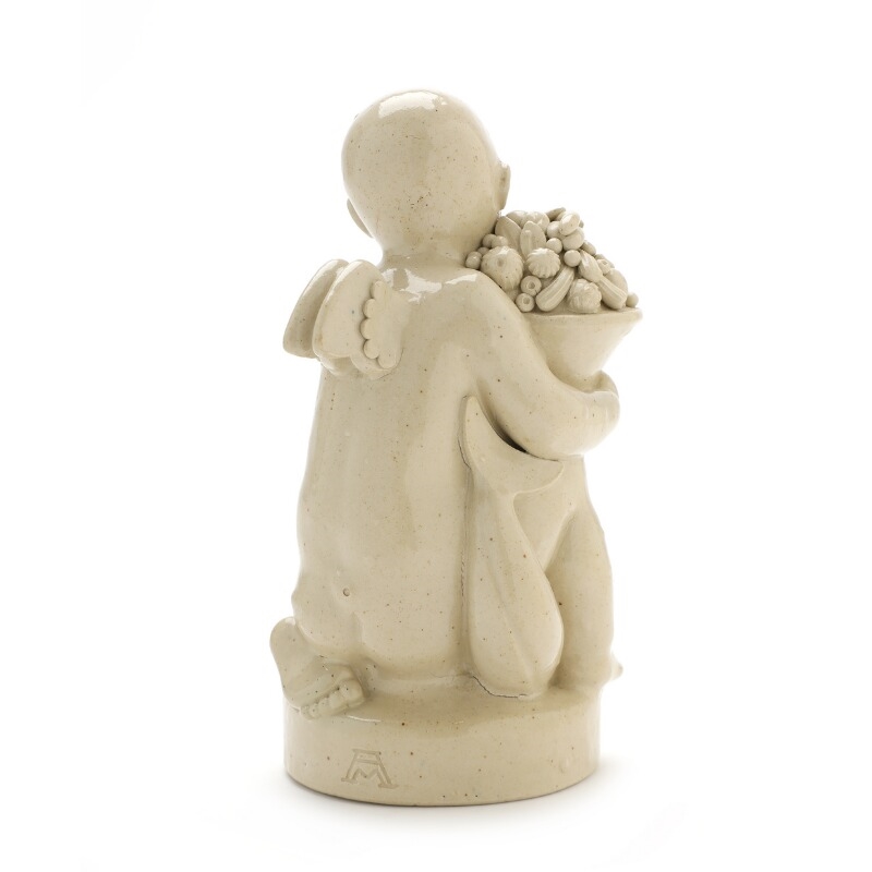 Artwork by Arno Malinowski, Stoneware figure group modelled in the shape of a cherub with dolphin and cornucopia, Made of Stoneware