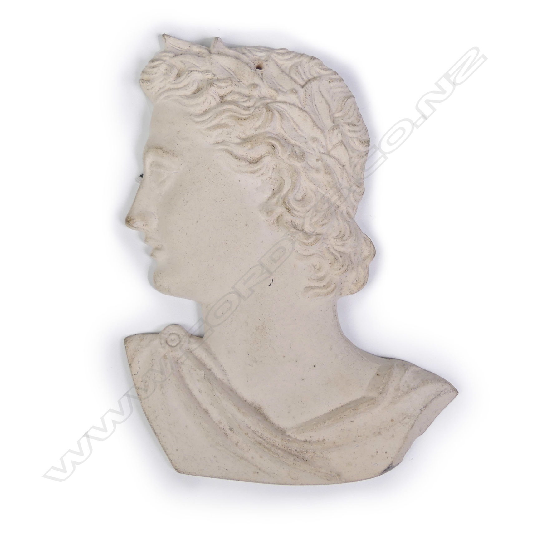 Artwork by Jack Hutchison, Wall mask of a classical gent in profile, Made of laurel leaf wreath headband, natural matt off-white unglazed biscuit finish