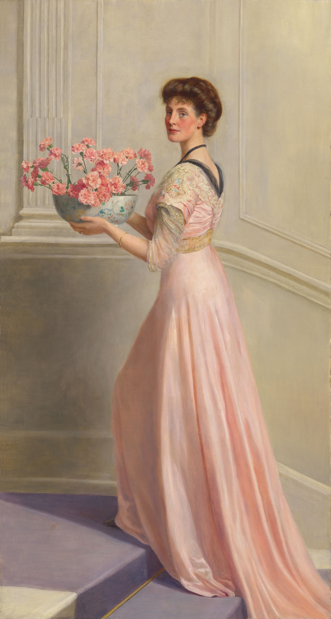 John Collier Portrait of a lady in pink carrying a bowl of pink
