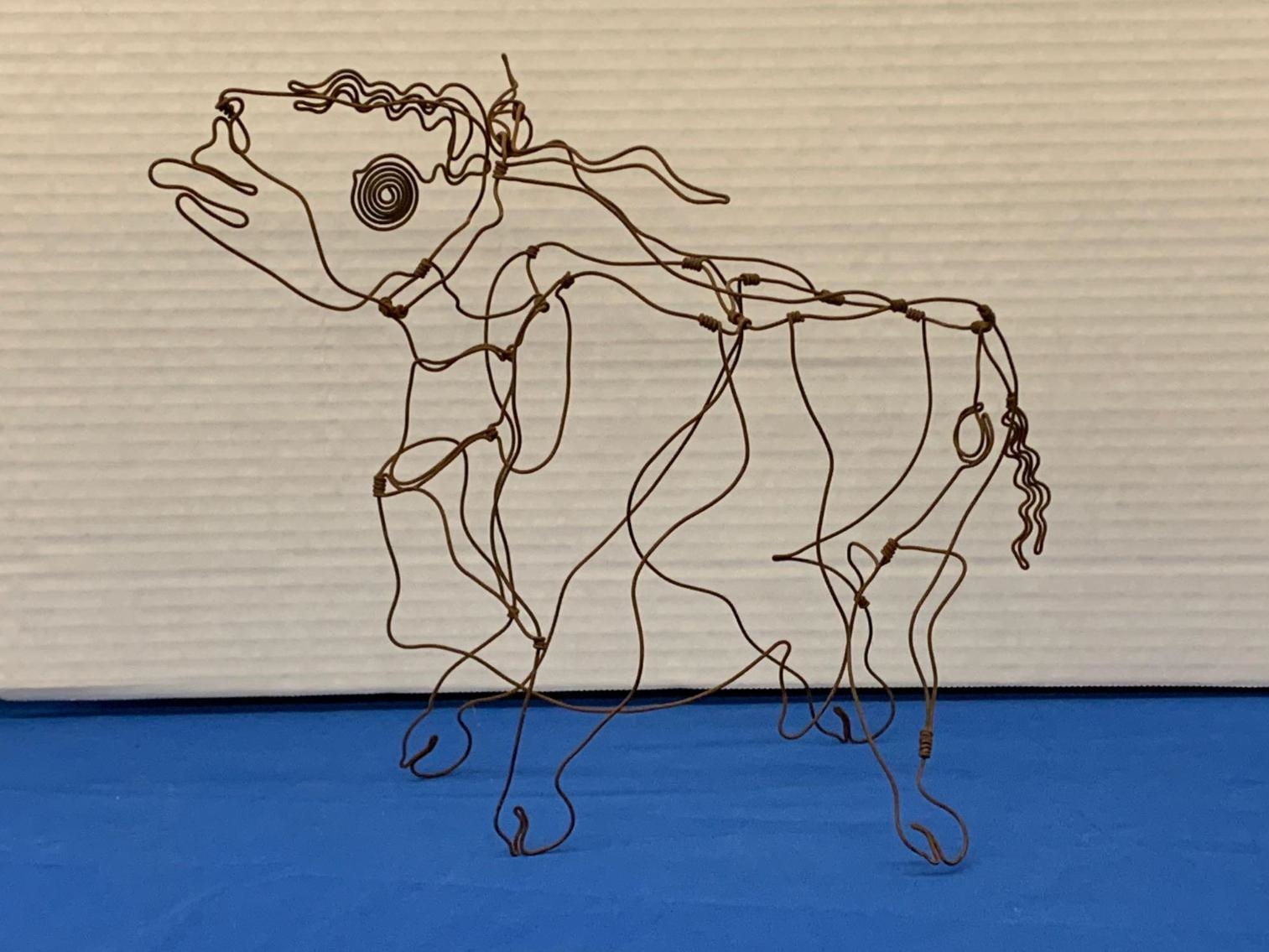 Artwork by Paul Gershowitz, Standing cow, Made of wire sculpture