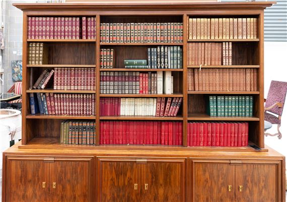 A FRENCH ART DECO FIGURED WALNUT LIBRARY BOOKCASE CABINET by Jules Leleu