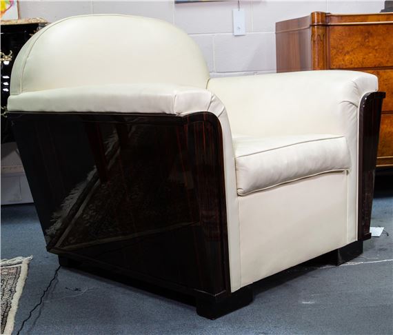 A PAIR OF FRENCH ART DECO MACASSAR EBONY AND LEATHER LOUNGE CHAIRS by Maison Dominique, CIRCA 1930S