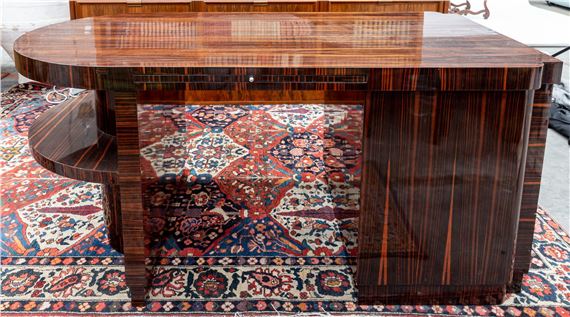 A FRENCH ART DECO PEDESTAL MACASSAR EBONY DESK by Maison Dominique