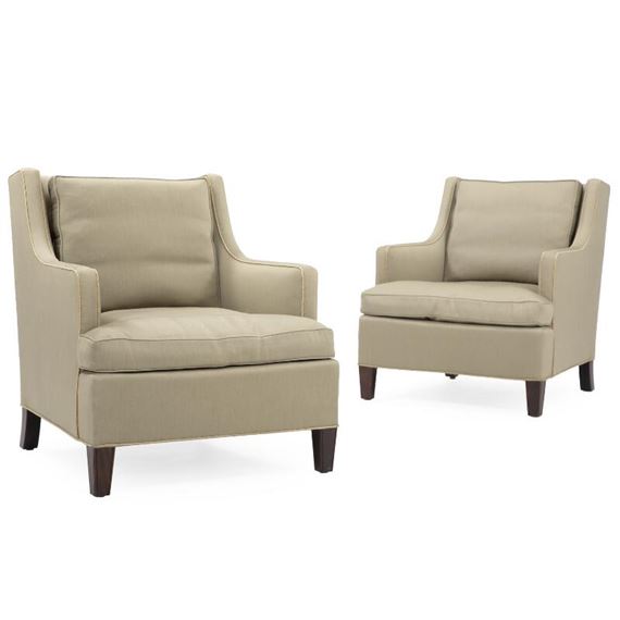 A pair of easy chairs with stained beech legs by Lysberg, Hansen & Therp