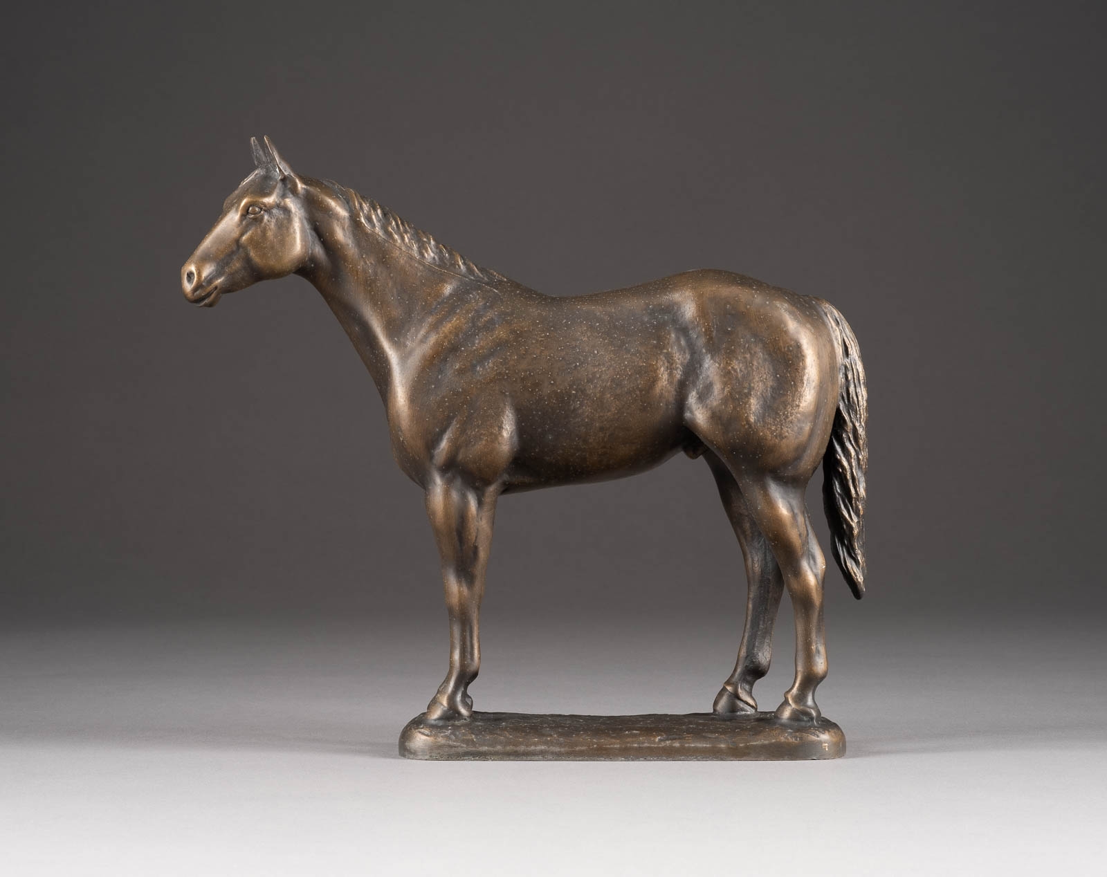 Artwork by Suzann Fiedler, STEHENDES PFERD, Made of light metal casting, brown patina