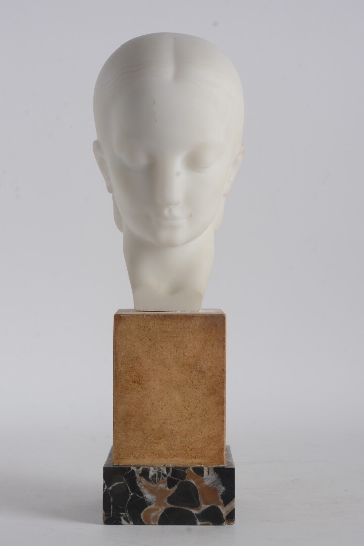 Artwork by Raymond Raffour, Tête de jeune femme, Made of Direct cut white marble finished in polishing. Stone and marble base