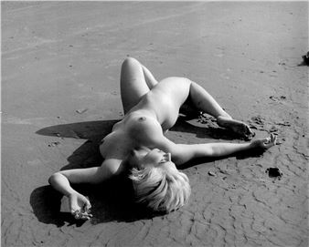 Naturism, woman on the beach, ball game, on the rocks - Russell Gay