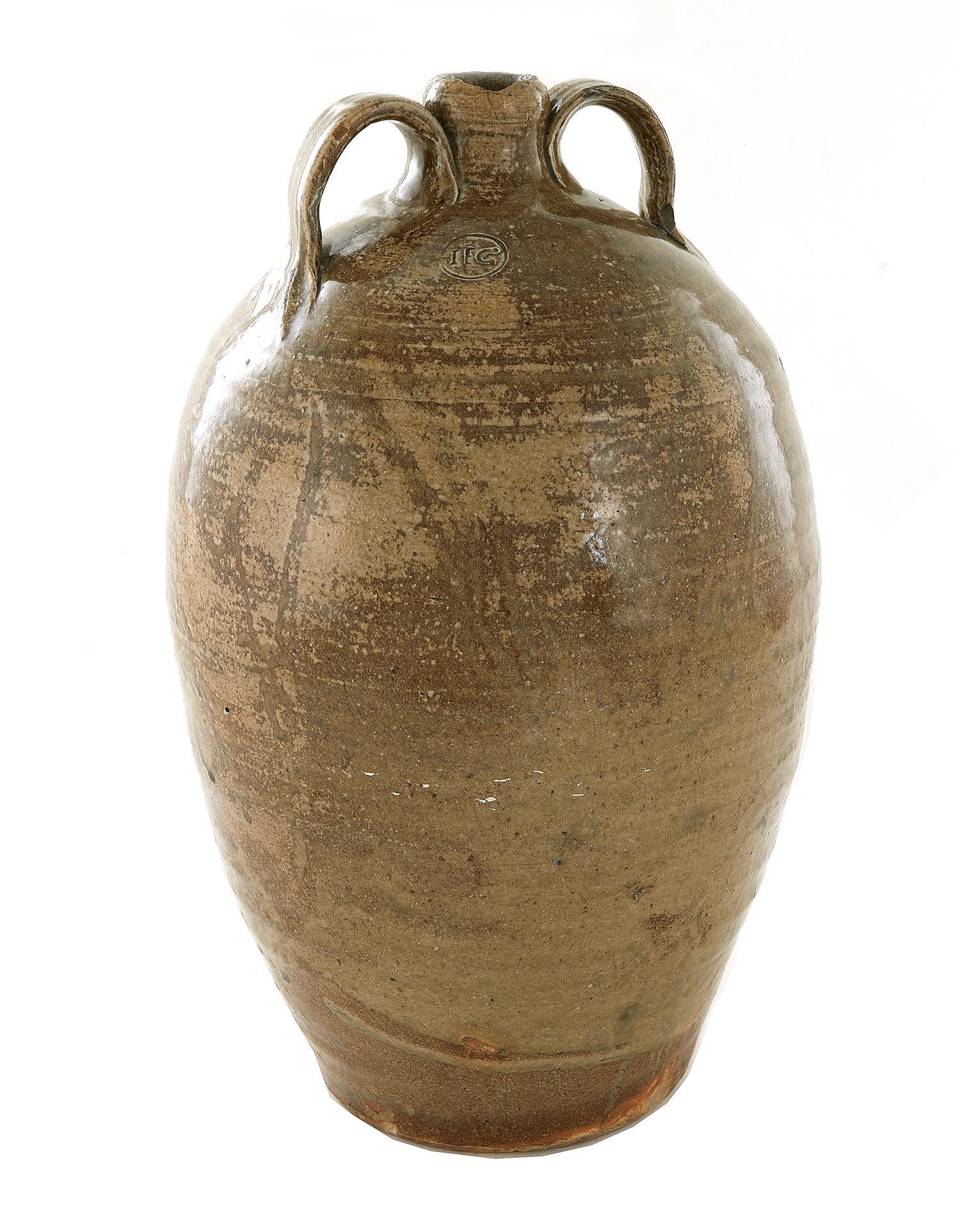 Artwork by Isaac E. Gay, Stoneware Jug, Made of ovoid form, shaped rim flanked by strap handles in cream alkaline glaze