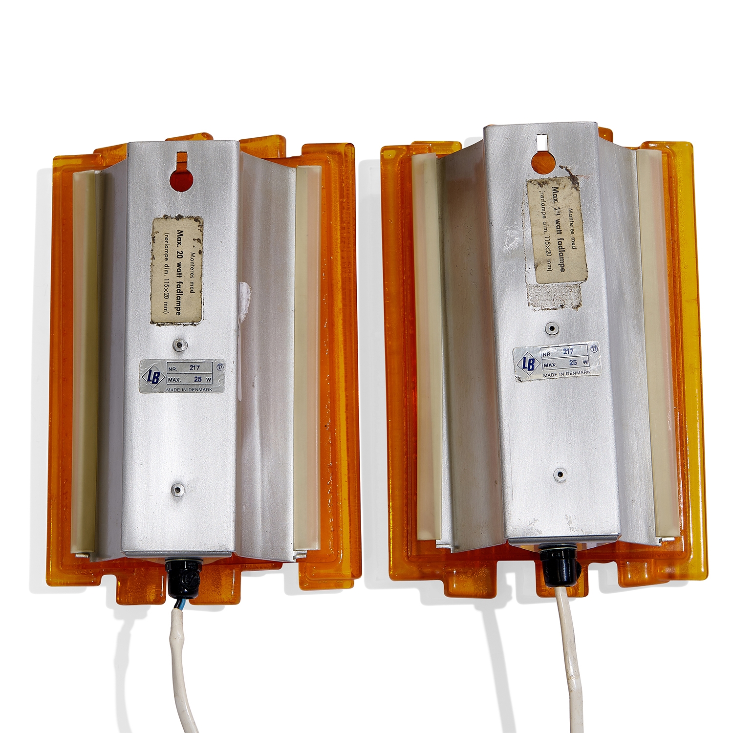 Artwork by Claus Bolby, Vega wall lights, pair, Made of orange acrylic resin, aluminum