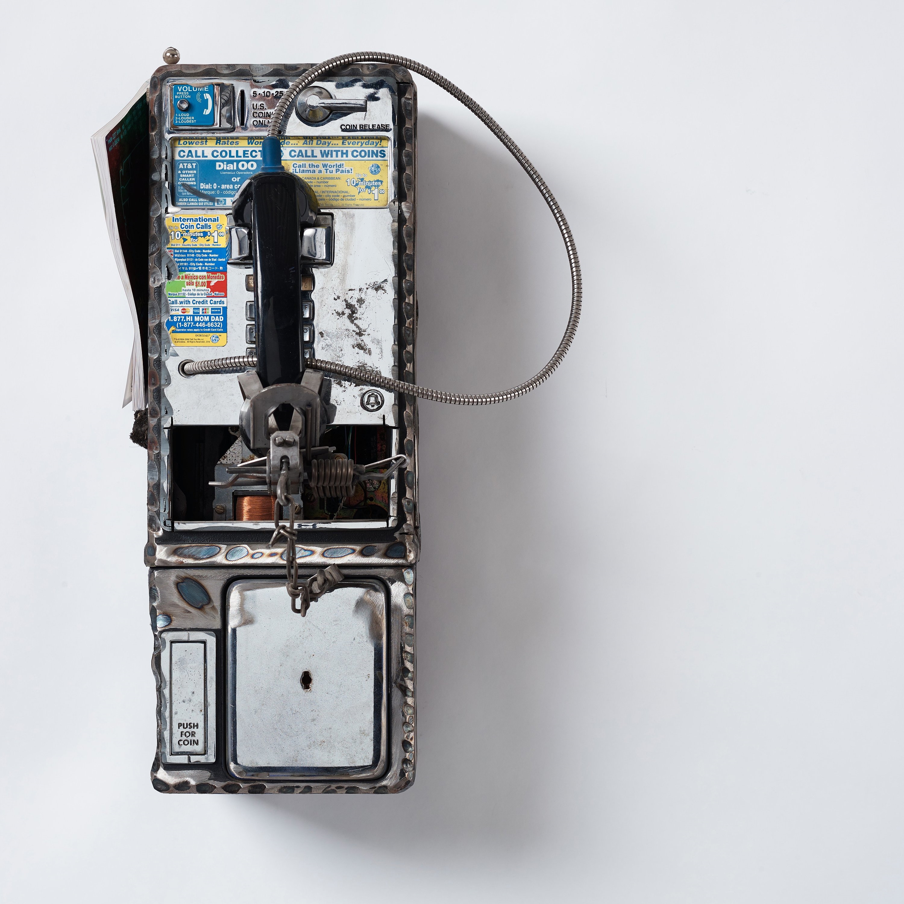 Artwork by Jason Matthew Lee, BRUTEFORCEPHREAK: thud, Made of Welded payphones, magnets, payphone dust, duct tape, small mammal trap, thud magazine