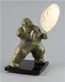 a green stone carving of a drum dancer - Peter Pitseolak