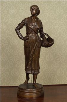 Lady holding a basket - E. Guilbert