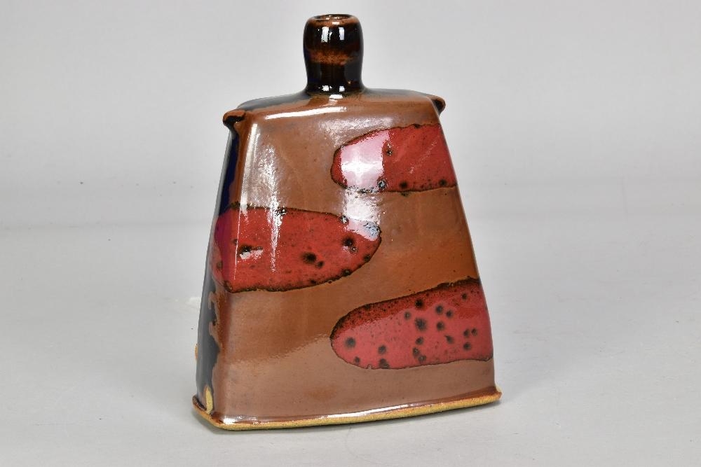 Artwork by James Hake, Rectangular bottle, Made of stoneware with copper red pours