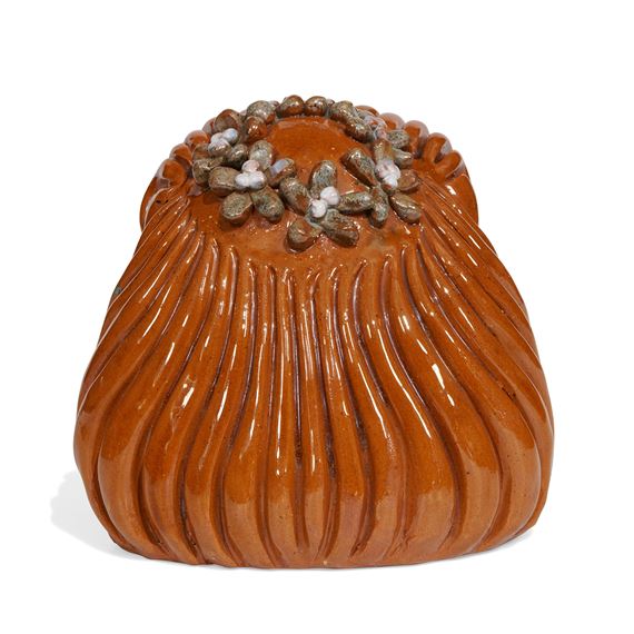 charming earthenware head of a red-headed jazz singer wearing a floral tiara - William Weldon Swallow