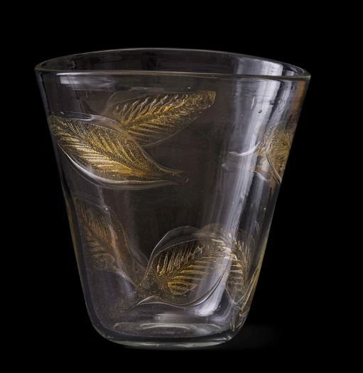 A truncated cone-shaped vase from the Autunnale series in clear glass with blown glass leaves in corpo and a gold leaf decor by Ercole Barovier, 1960