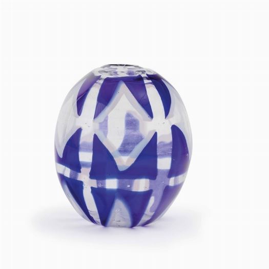 A rare egg-shaped blown glass vase with a decor of large geometric milk-white and blue murrine on a clear backdrop