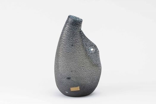 A Barbarico glass pot-shaped vase with a metallic powder decor and a perforated handle. Iridised surface