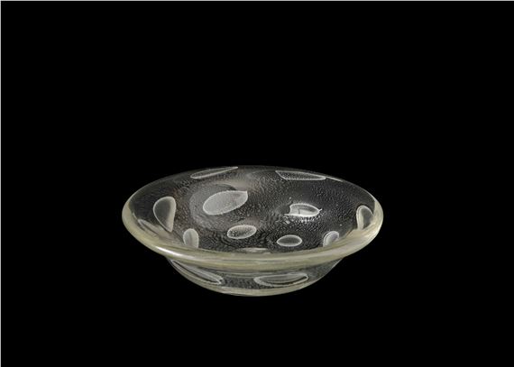 A heavy glass bowl from the Superbolle series with a decor of large submerged bubbles