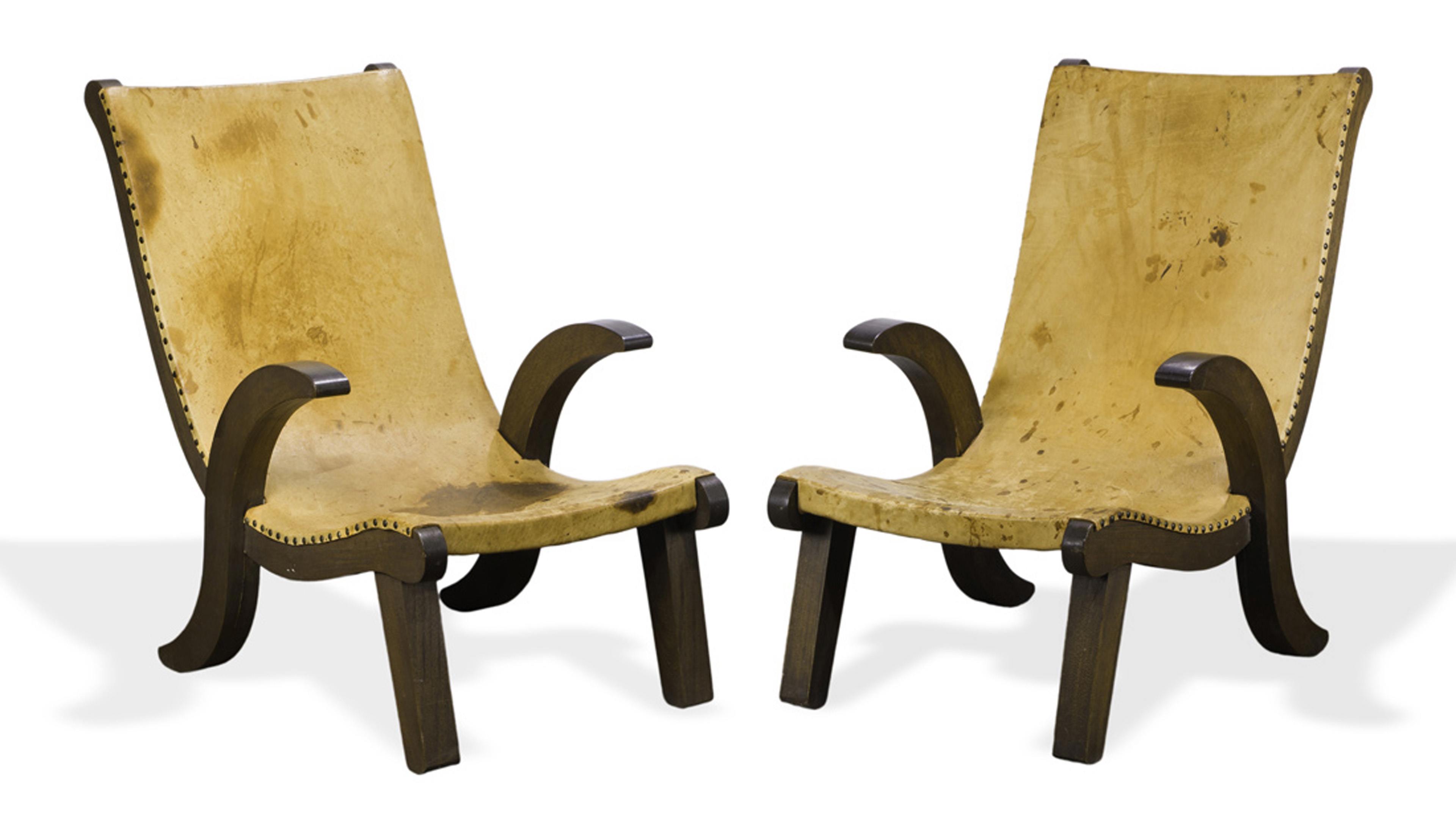 A pair of Clara Porset style Butaque chairs by Clara Porset