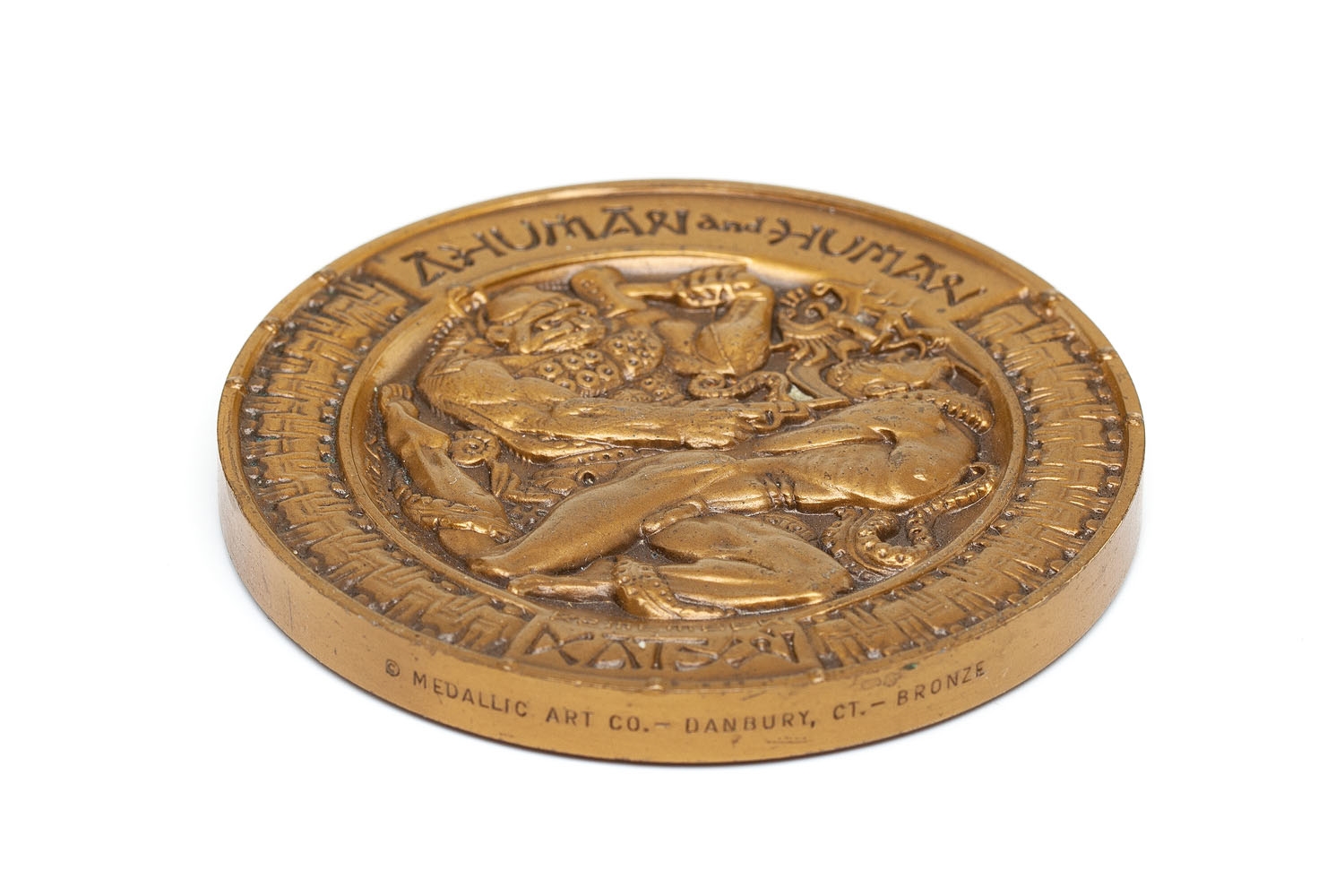 Artwork by Stanislaw Szukalski, Medal katyński, Made of BRONZE