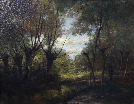 Knotwilgen aan een beekje met wandelaar