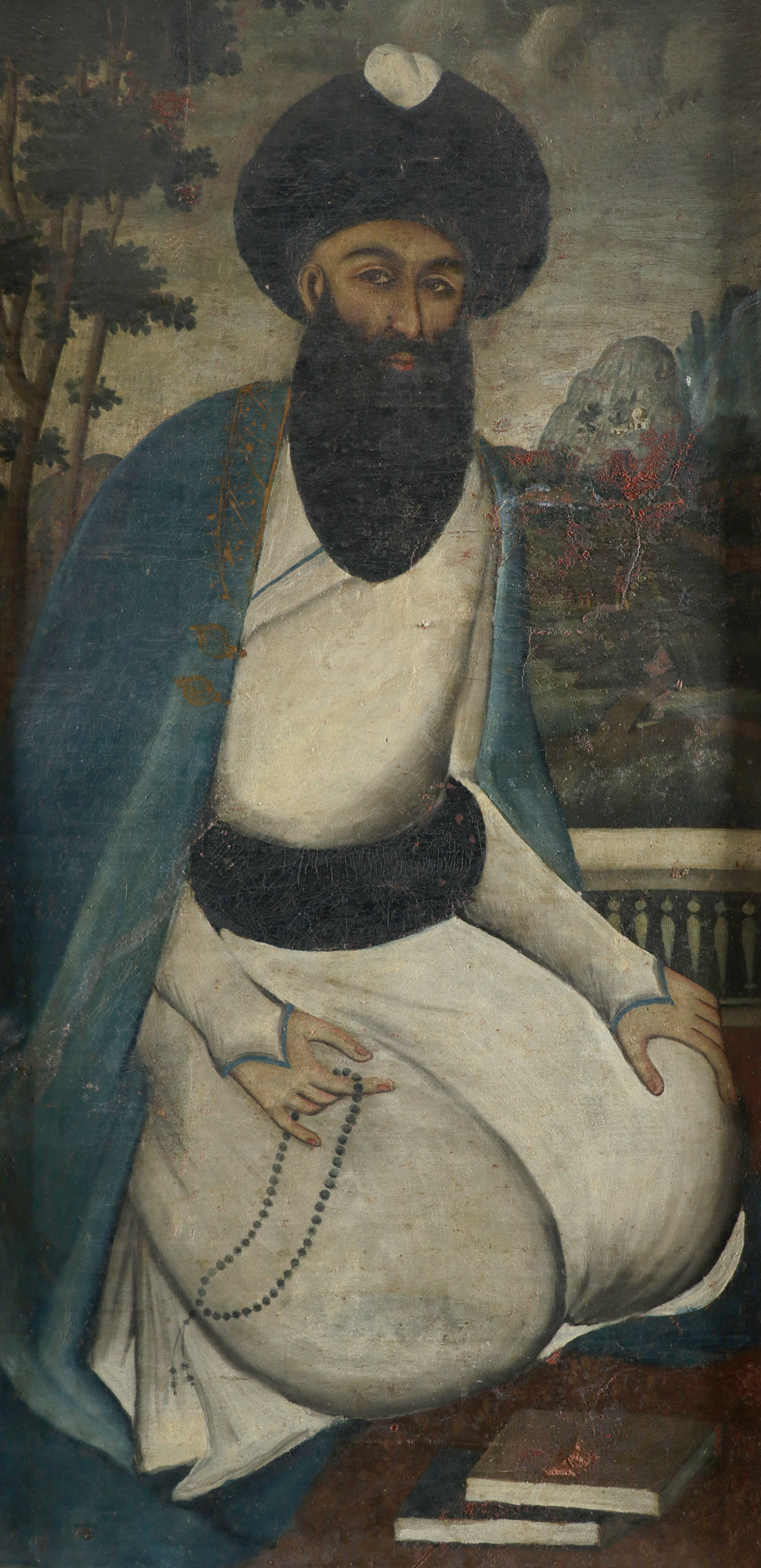 Portrait of a mullah kneeling on a terrace by Persian School, 19th Century, 19th Century