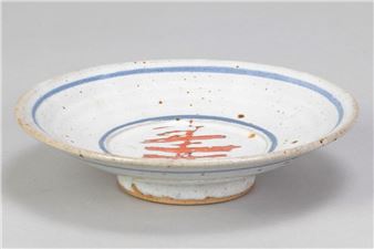 a stoneware footed dish covered in grey glaze with wax resist decoration to well - Colin Kellam