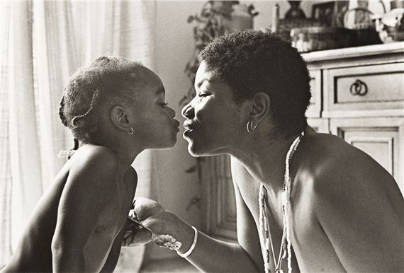 Darquita and Daughter. by Joan E. Biren, 1979