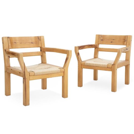 A pair of pine easy chairs