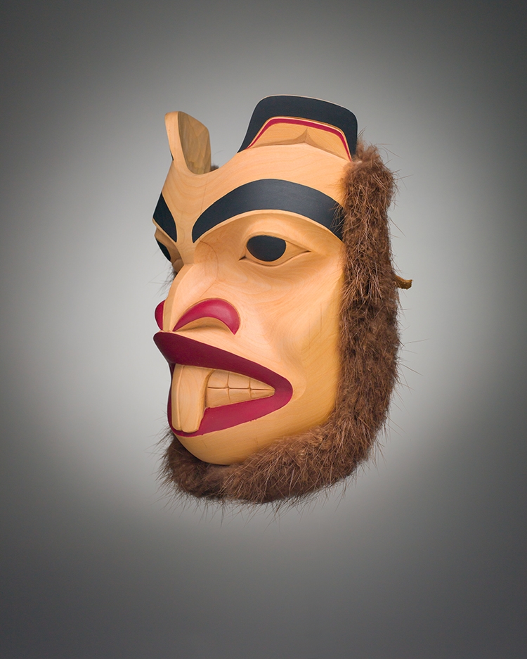 Artwork by Titus Auckland, Beaver Mask, Made of carved cedar, fur, acrylic