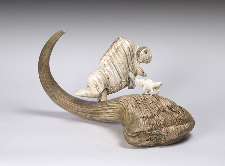 Artwork by Damien Iquallaq, Muskox and Wolf, Made of muskox horn and mammoth ivory