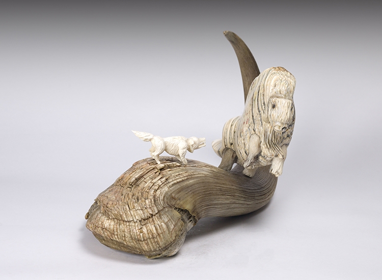 Artwork by Damien Iquallaq, Muskox and Wolf, Made of muskox horn and mammoth ivory