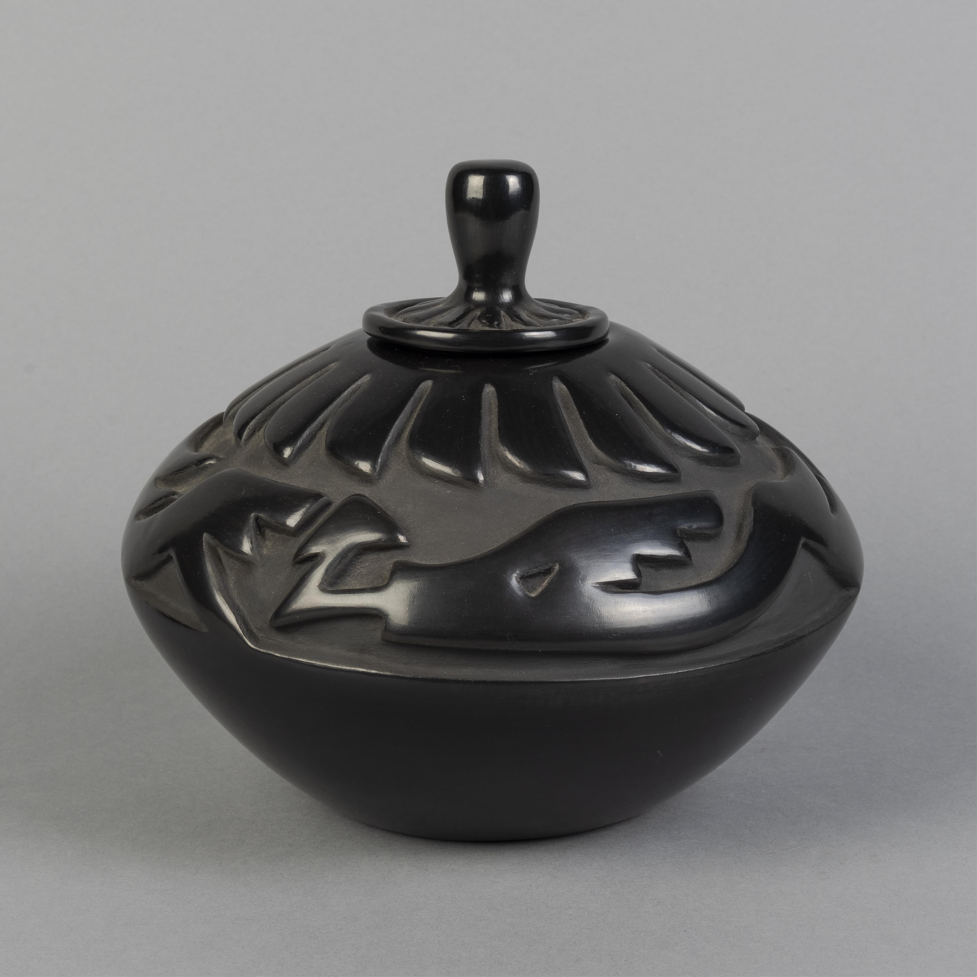 Artwork by Anita Louise Suazo, Carved and Lidded Blackware Jar, Made of fired clay