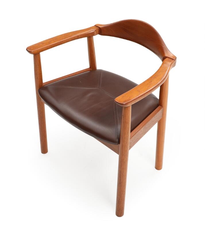 Artwork by Andreas Hansen, A free-standing teak writing desk and armchair, Made of brown leather