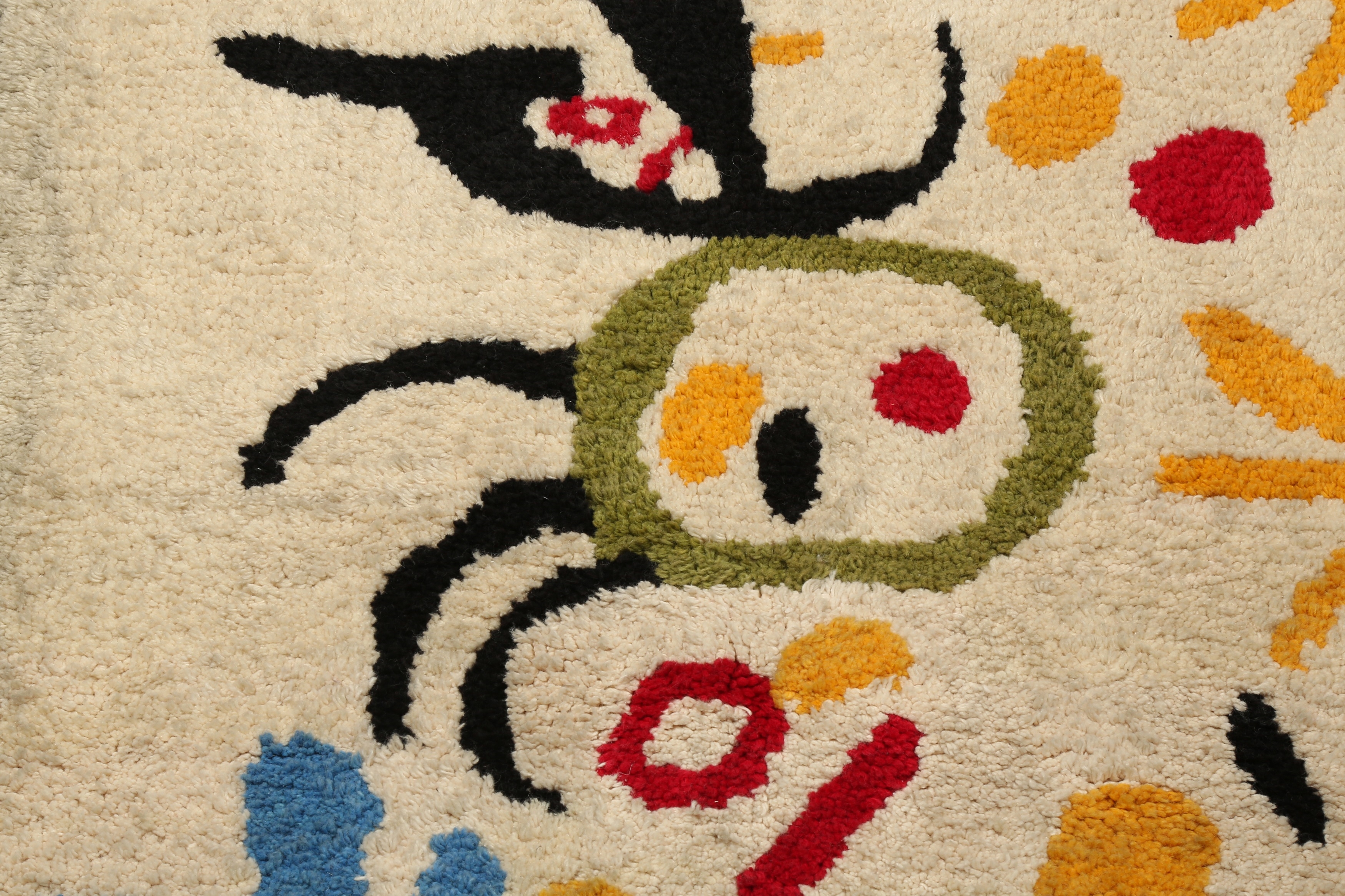 Joan Miró | a pair of tufted rugs | MutualArt