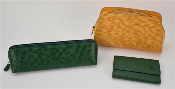 Louis Vuitton, Three Louis Vuitton Epi Leather articles including a yellow cosmetics  pouch, a green pencil case and a green key holder