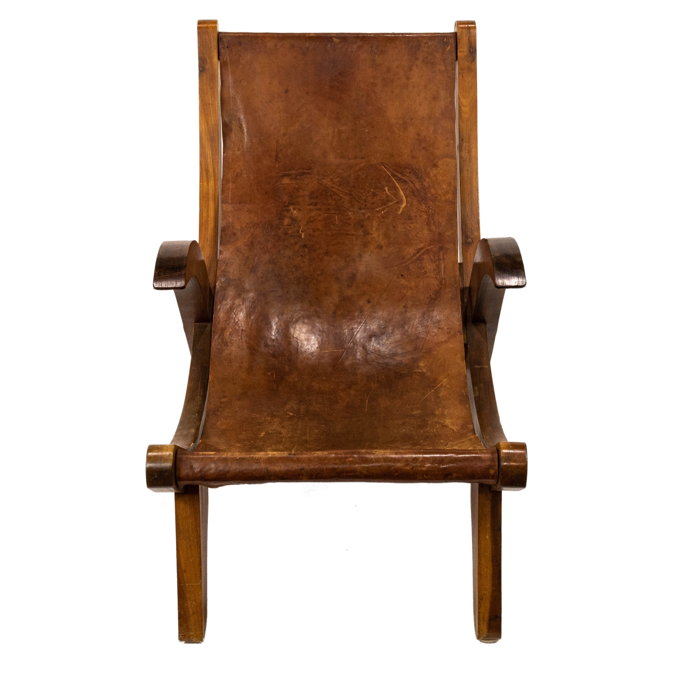 Artwork by Clara Porset, Butaque chair, Made of wood, leather