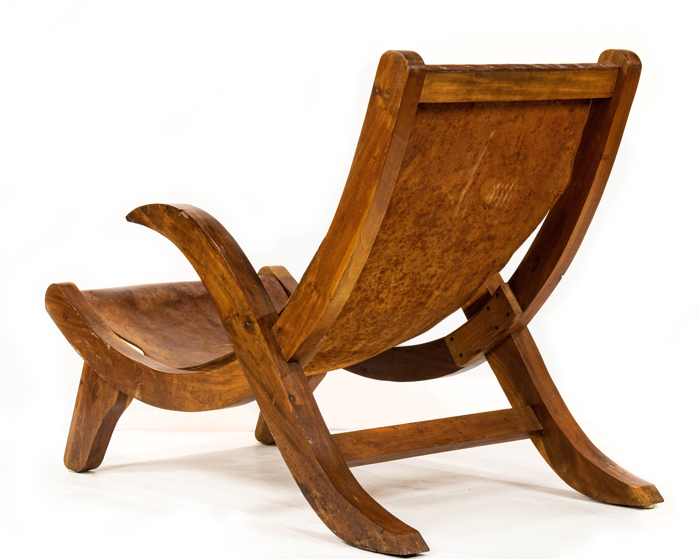Artwork by Clara Porset, Butaque chair, Made of wood, leather