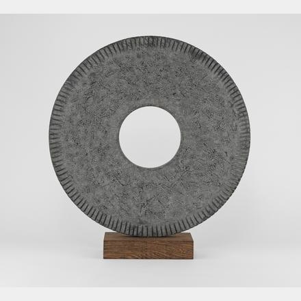 Artwork by Alexia Weill, Variations, Made of basalt carved on a wenge wood plinth