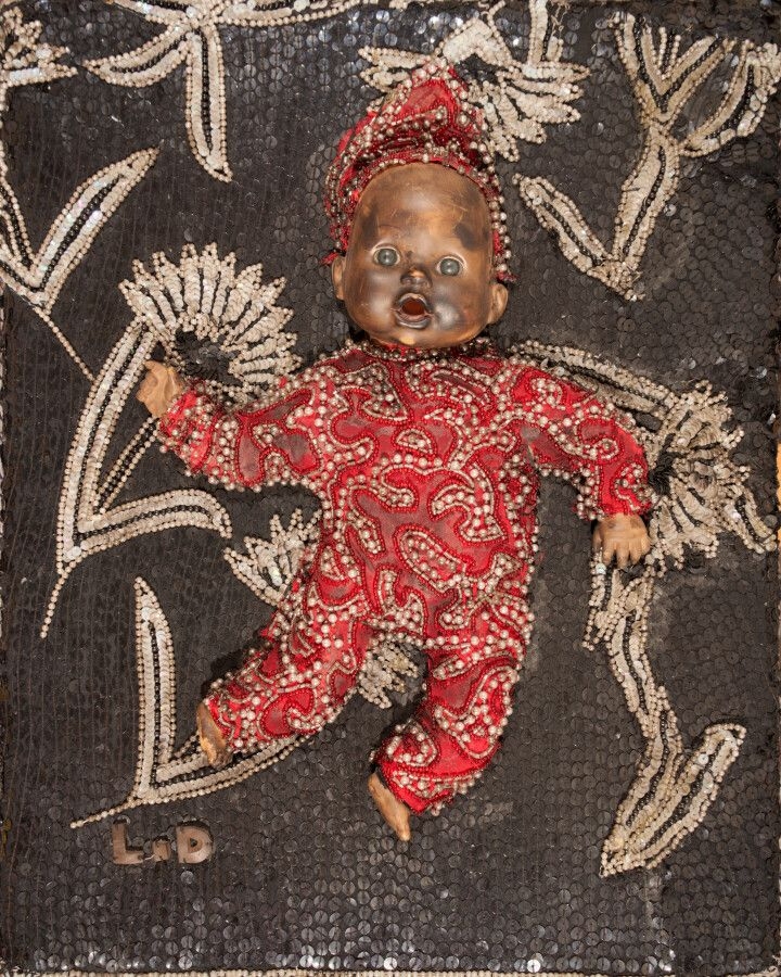 Artwork by Lhérisson Dubréus, Ogou, Made of Sequins and doll on fabric
