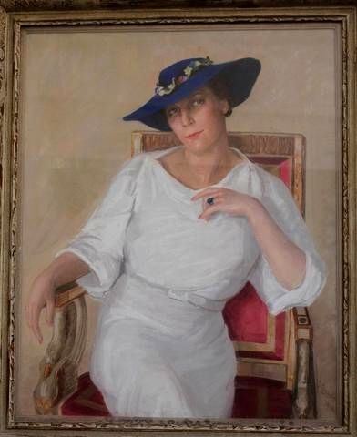 Portrait of a woman with a blue hat - J. Cernaise