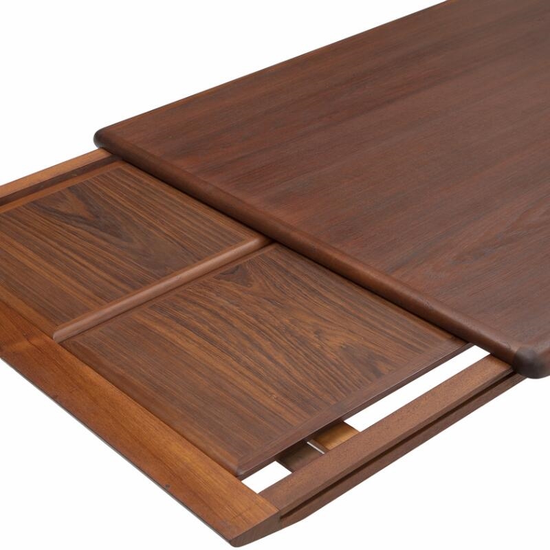 Artwork by Johannes Andersen, A teak dining table