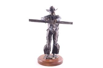 Cowboy Taking a Break from Branding - J.R. Eason