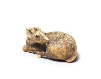 NETSUKE OF A RECUMBENT DEER - Osaka Garaku