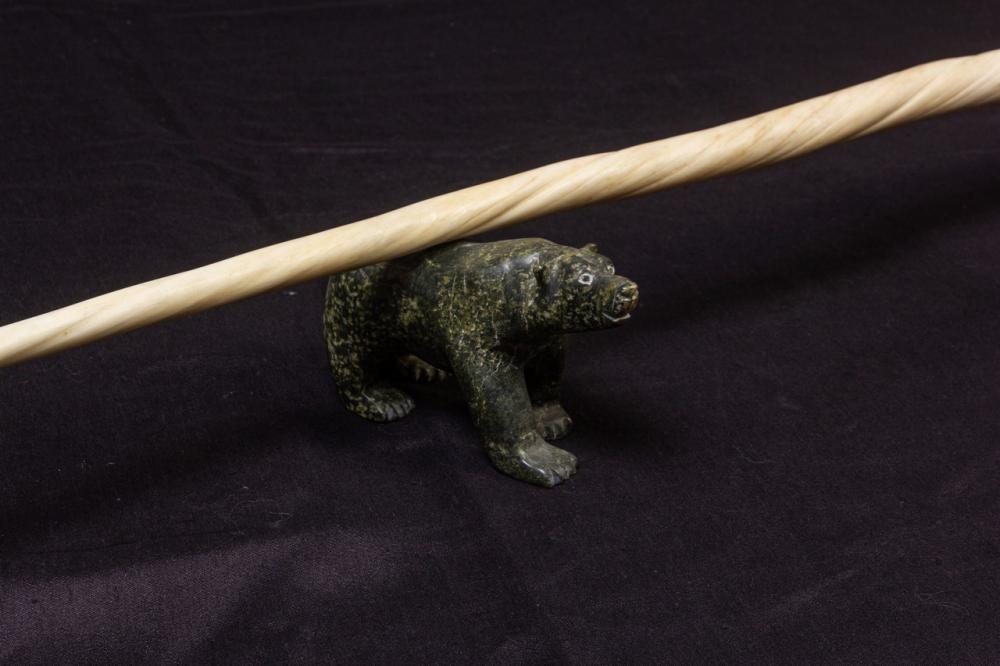 Artwork by Adla Korgak, Allan Sheutiapik, A narwhal tusk supported on a pair of polar bears, Made of carved of Iqaluit