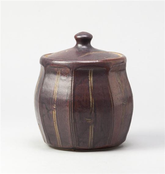 a cut sided stoneware jar and cover by John Jelfs