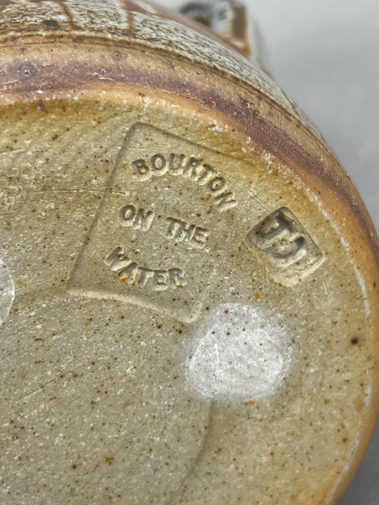 Artwork by John Jelfs, a stoneware jug with striped decoration, Made of stoneware