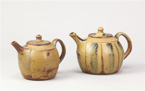 a stoneware teapot covered in ochre glaze with incised and painted decoration by John Jelfs, circa 1999
