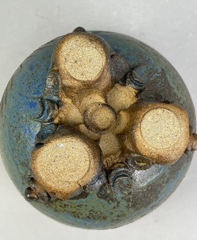 Artwork by Peter Gooderham, a deep stoneware bowl on tripod feet with applied and incised landscape decoration, Made of stoneware