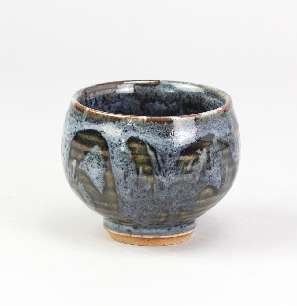 Nick Rees | a stoneware yunomi covered in dark green glaze with blue ...